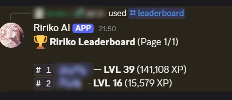 The reply to /leaderboard: the top two members with their level and XP.